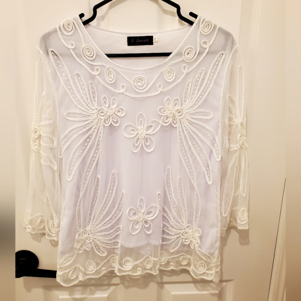 White embroidered blouse, lined body, sheer sleeves
